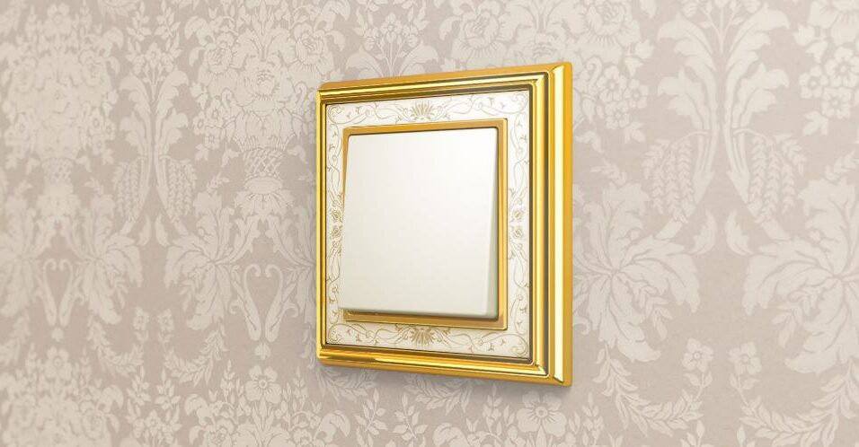 gold rimmed plate with off white fittings