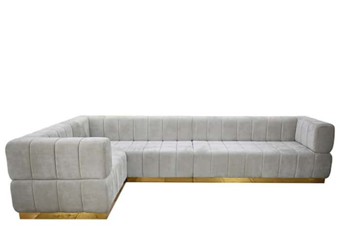 grey couch with tufted pattern