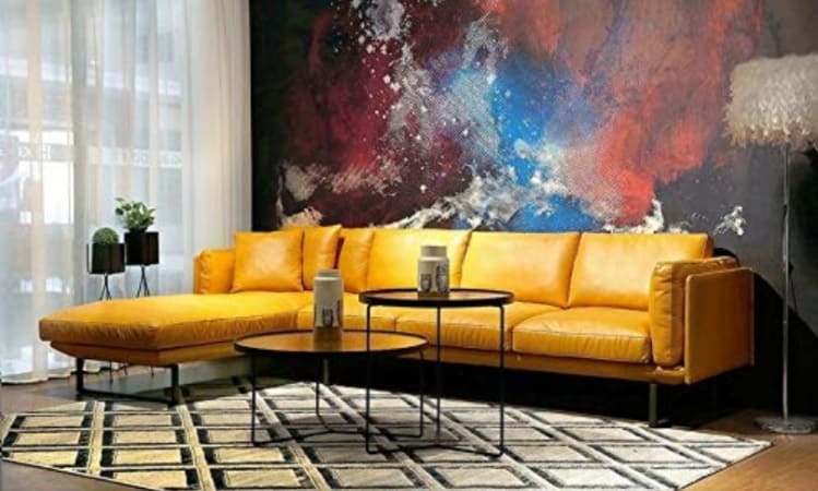 yellow leatherette couch in colourful living room