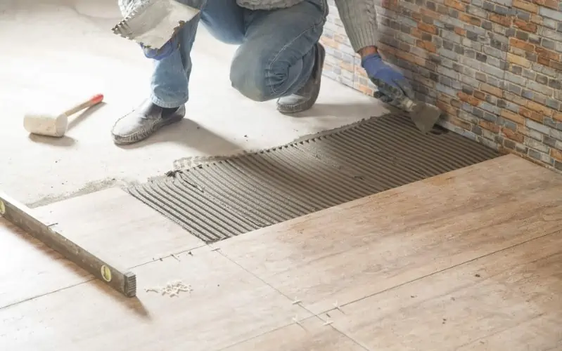 a wood finish tile laying work