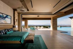 wooden false ceiling in an open plan bedroom of a holiday home