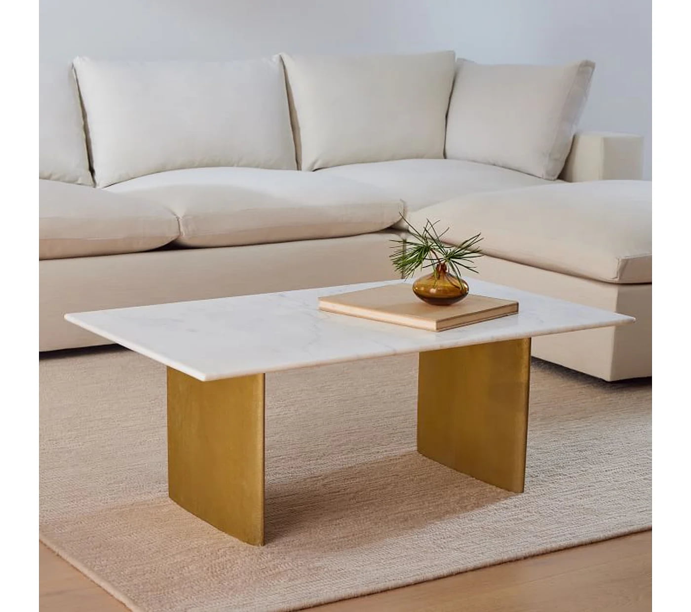 marble table top, sleek gold faux base, beige coloured sofa, classic styled centre piece for your living room, carpet, wooden laminated floor