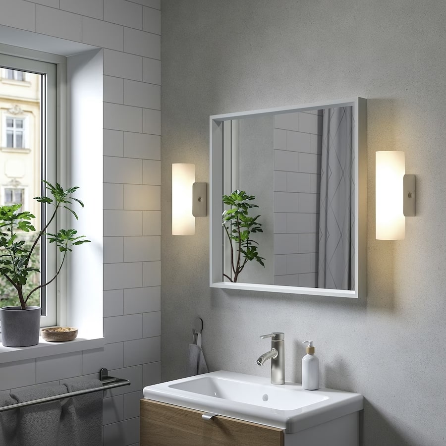 wall sconce, white bathroom, single vanity wash basin