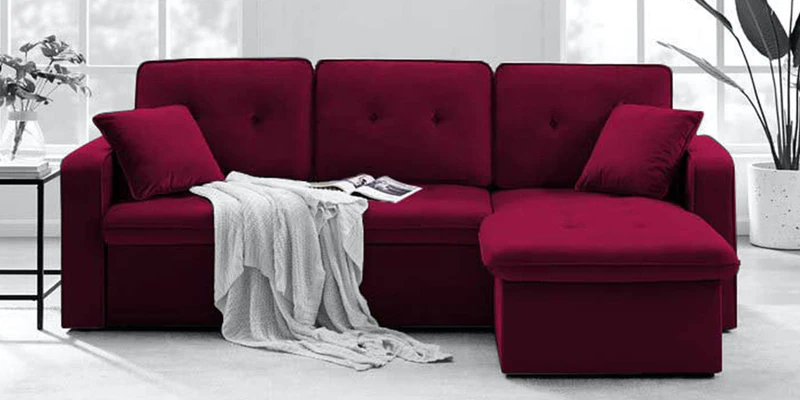 crimson red L-shape sofa cum bed, white floor, white walls, beautiful living room