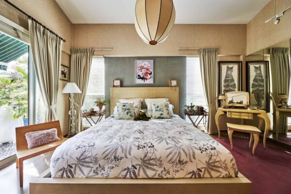 luxury bedroom design with neutral colour scheme and mid-century decor