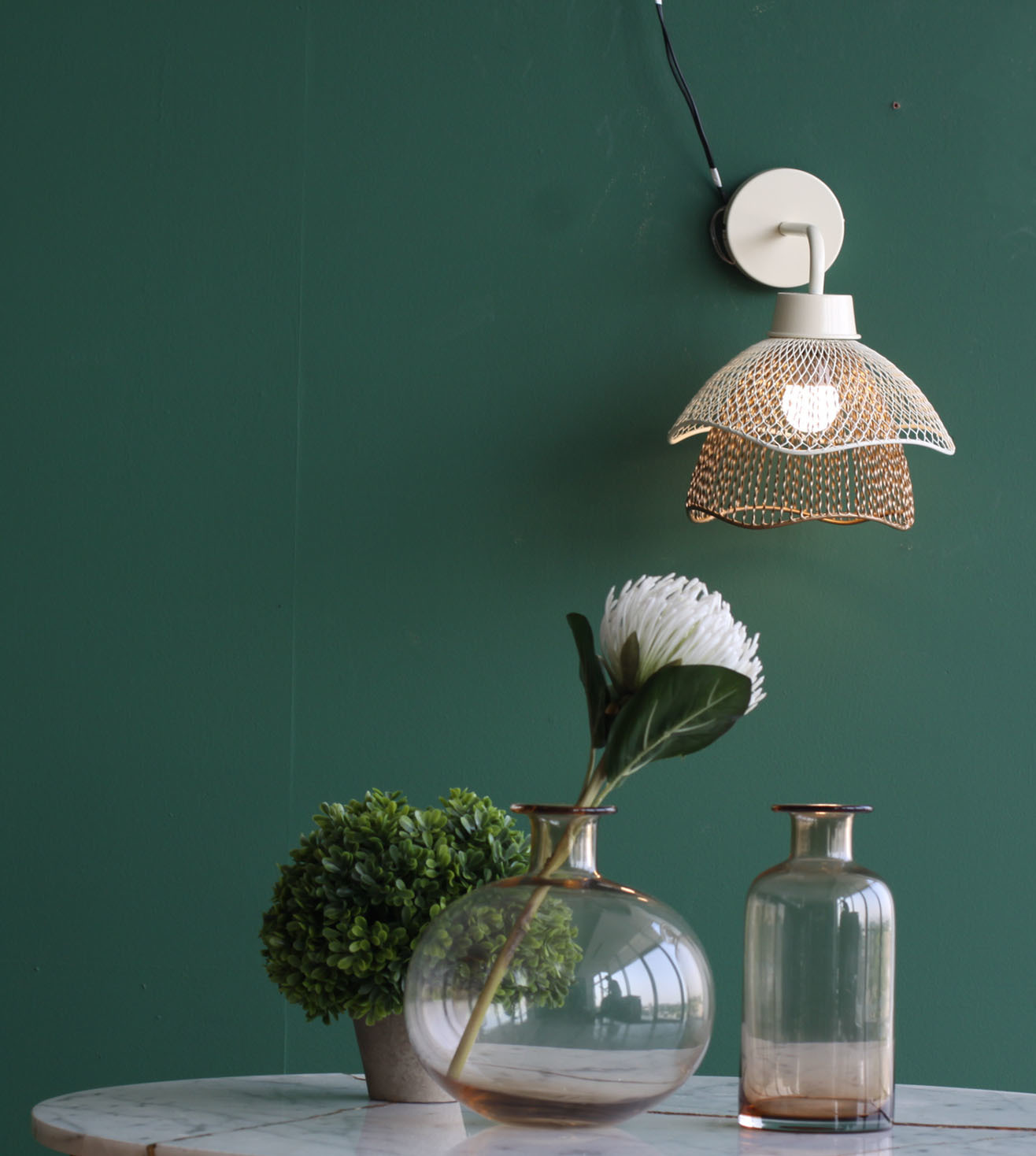 beautiful lamp, with a bulb in centre and elegant net structure around