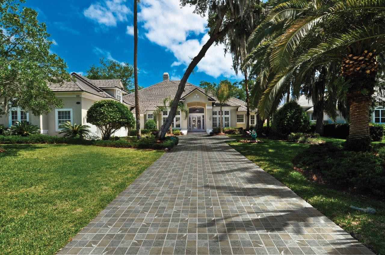 green grass and tiled floor