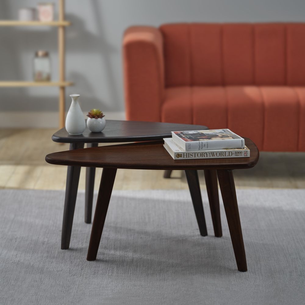  free-form centre piece, wooden coffee table, sleek wooden legs, orange sofa, grey carpet , wooden shelf, books