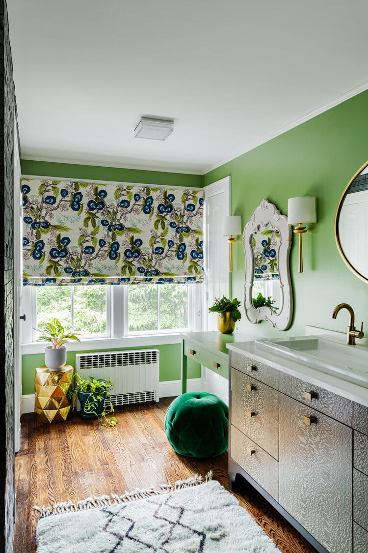 compact bathroom with decorative prints, mirror, vanity