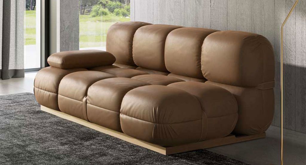 tan leather sofa bed, carpet, living room, grey walls, classic living room