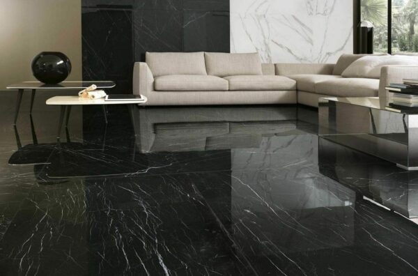 polished finish for black granite flooring with cream sofa