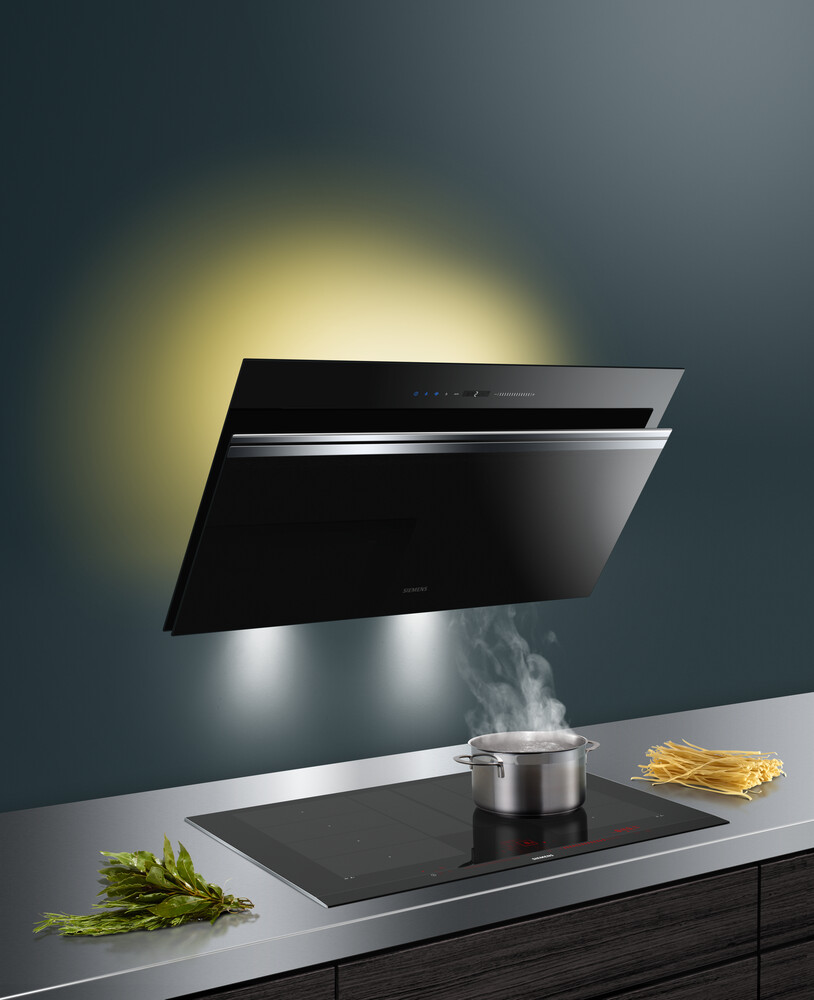 inclined wall mount chimney with emotionLight Pro feature, modern modular kitchen chimney design