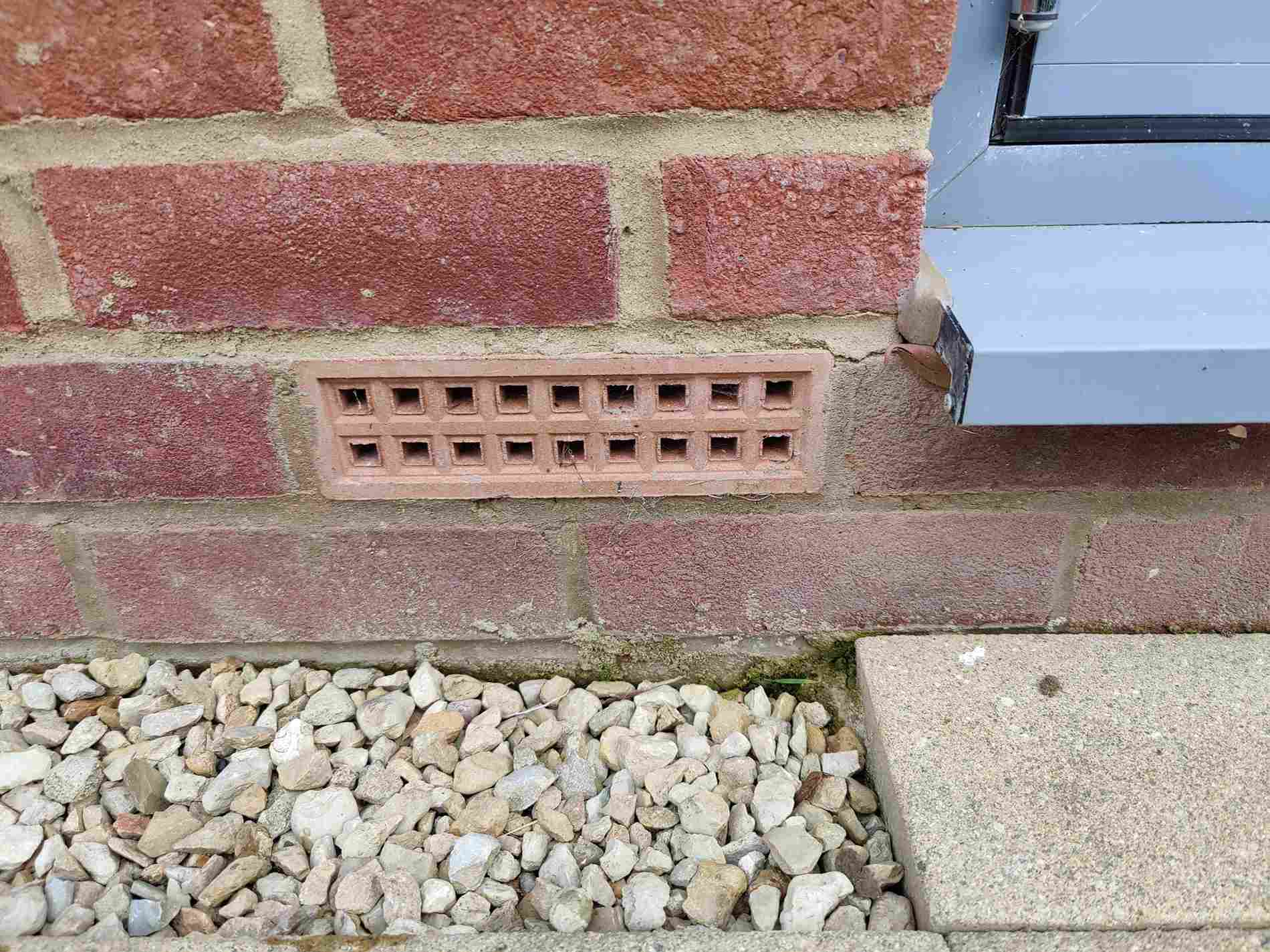 airbricks in a home with red wall