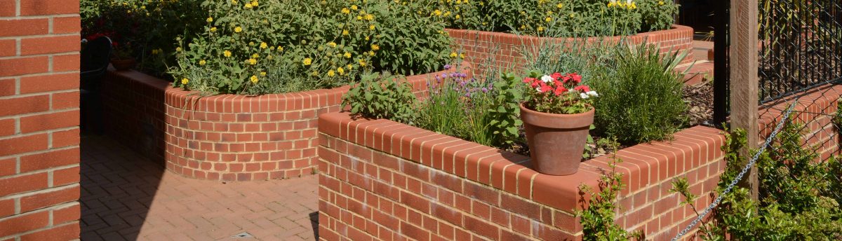 red walls in a garden