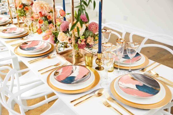 white dining table with Cutlery, plates, napkins, candles, floral decorations and glasses elegant & formal dining table setting decor ideas