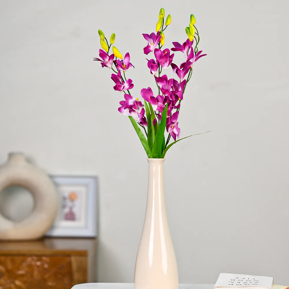 beautiful purple blossoms placed in a vase for room decor