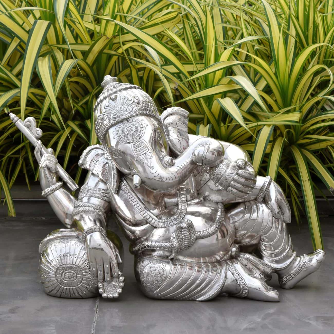 silver Ganapati figurine, resting posture, beautiful accent piece for decor,