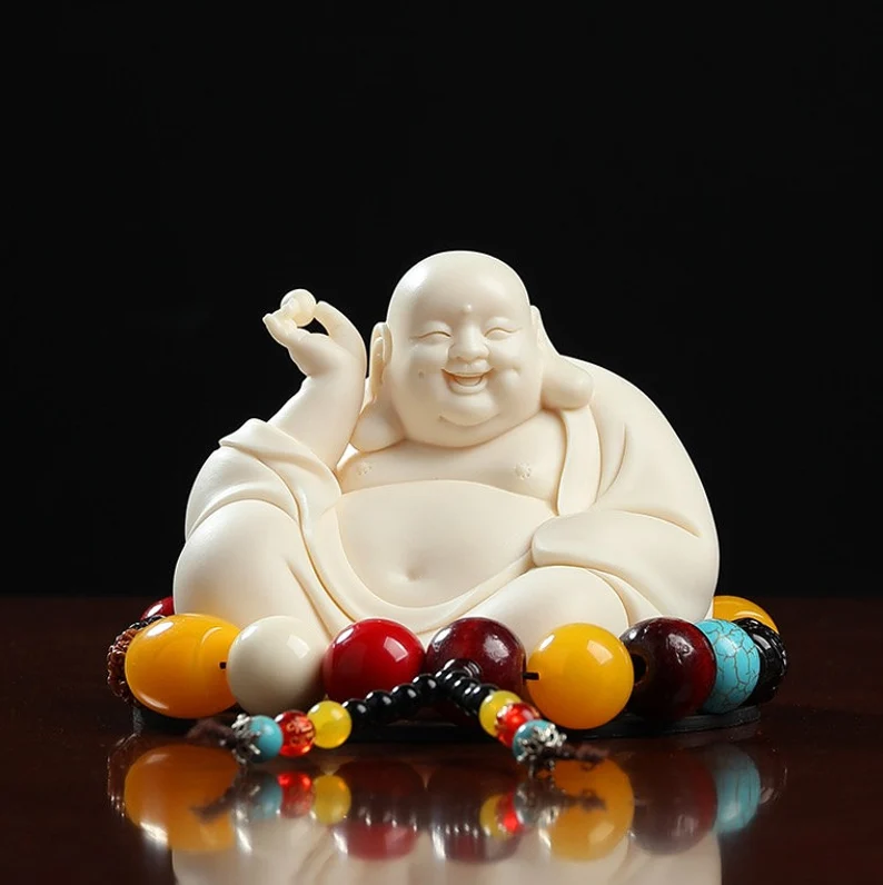 Laughing Buddha with ornaments, pearls
