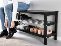 black metal shoe rack, shoes, rug