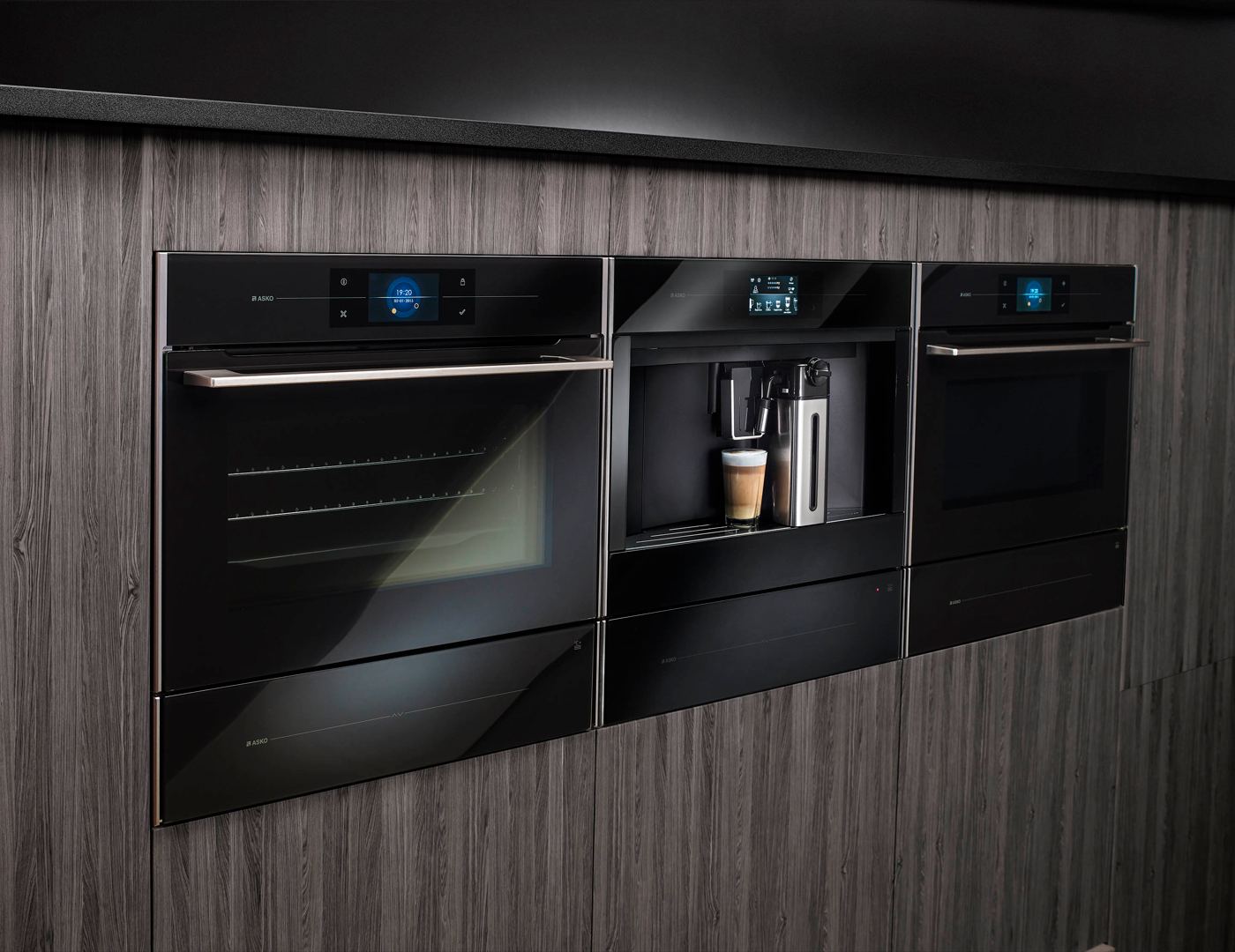 built in kitchen appliances in a brown niche in kitchen wall cabinets