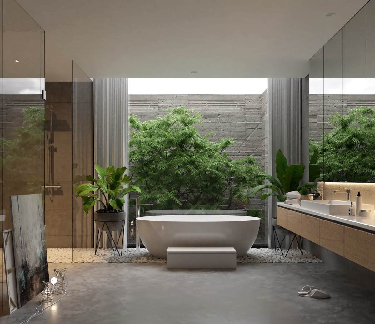grey bathroom with a bathtub, green plants, brown cabinets, mirrors and washbasin