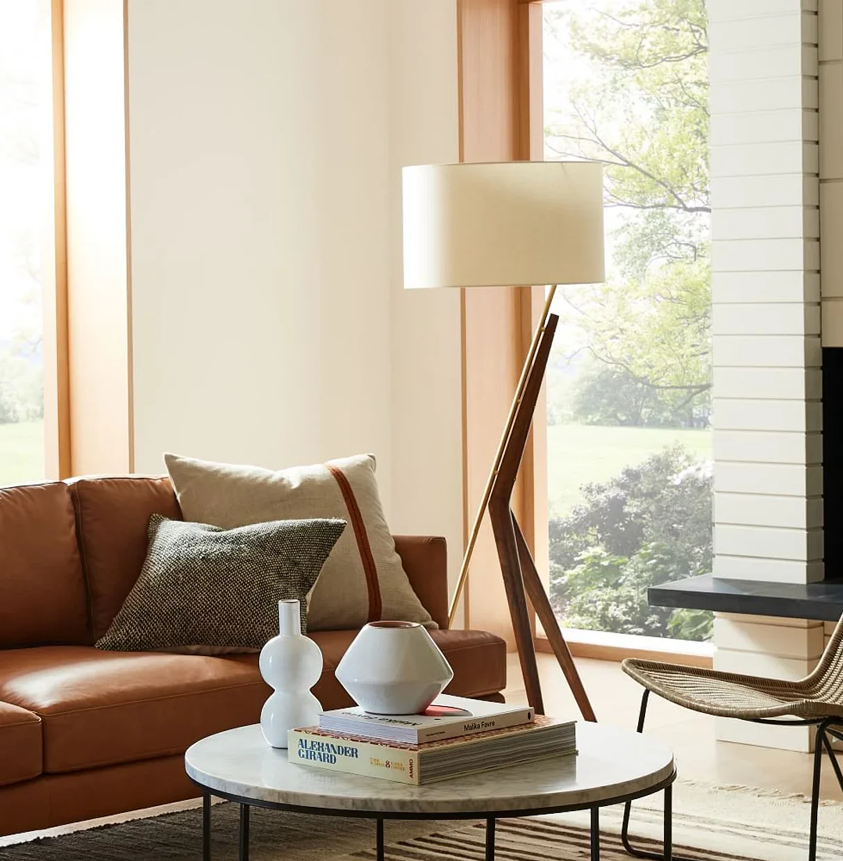 Brazilian mid-century floor lamp, elegant wooden base, placed near the living room sofa, coffee table placed in the middle, wooden flooring