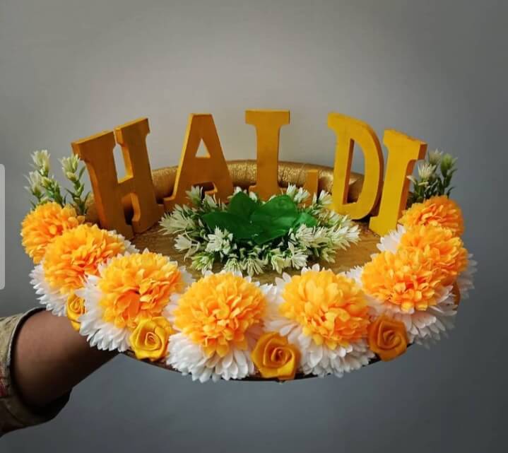 Colourful floral haldi platter