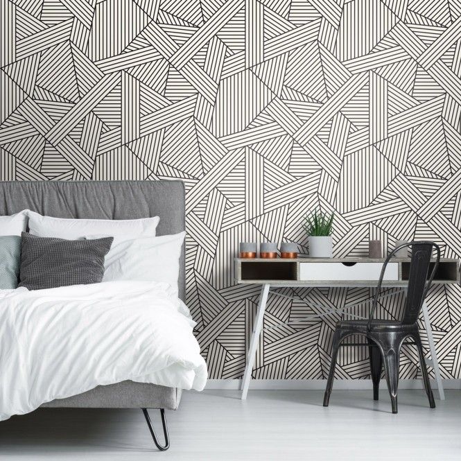 minimalist wall decor, geometric shapes making the bedroom wall stand out, bed, console table