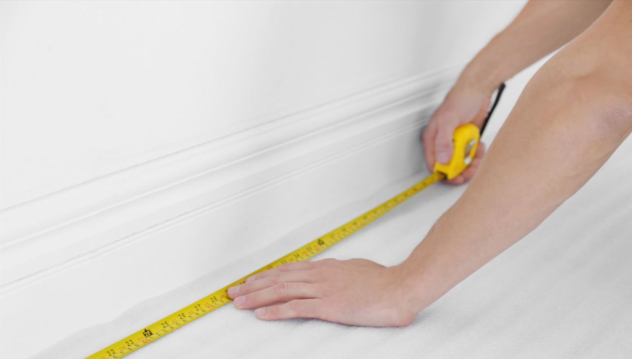 Measuring the floor of your bathroom.