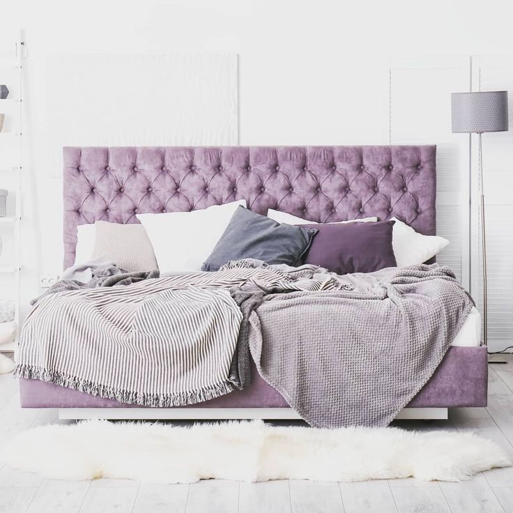 lilac sleeping room, with white flooring, faux fur white rug, classic decor