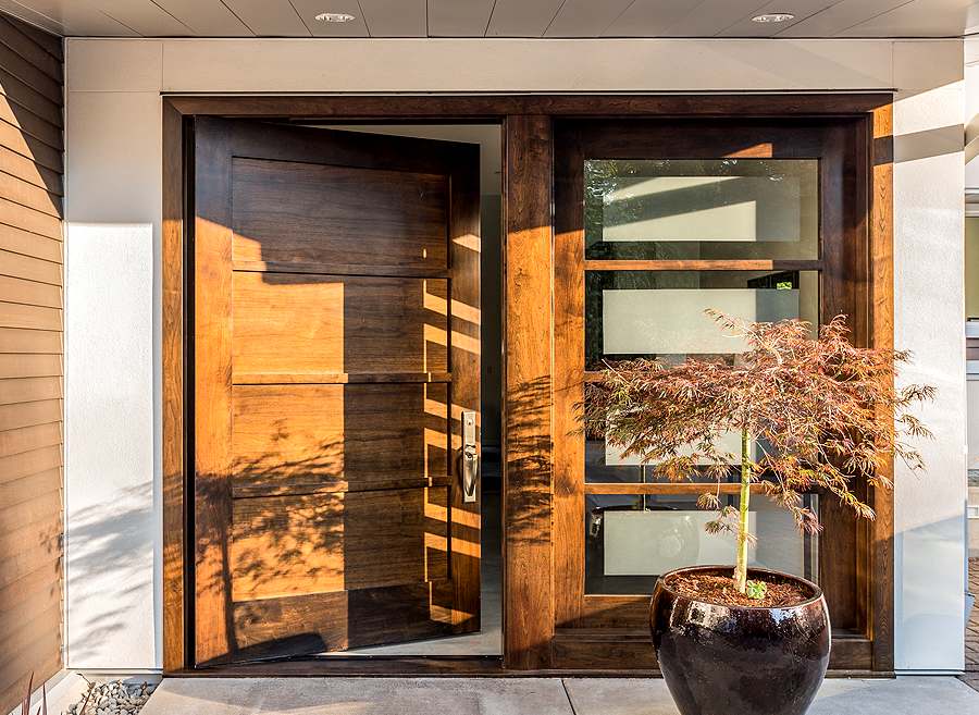 brown wooden door with glass panels