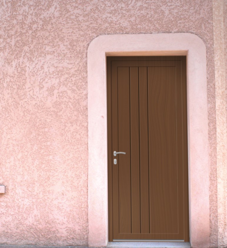 brown wooden door in a pink house