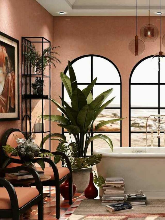 pink paint in a bathroom with bathtub, indoor plants, chandelier, wink with mirror