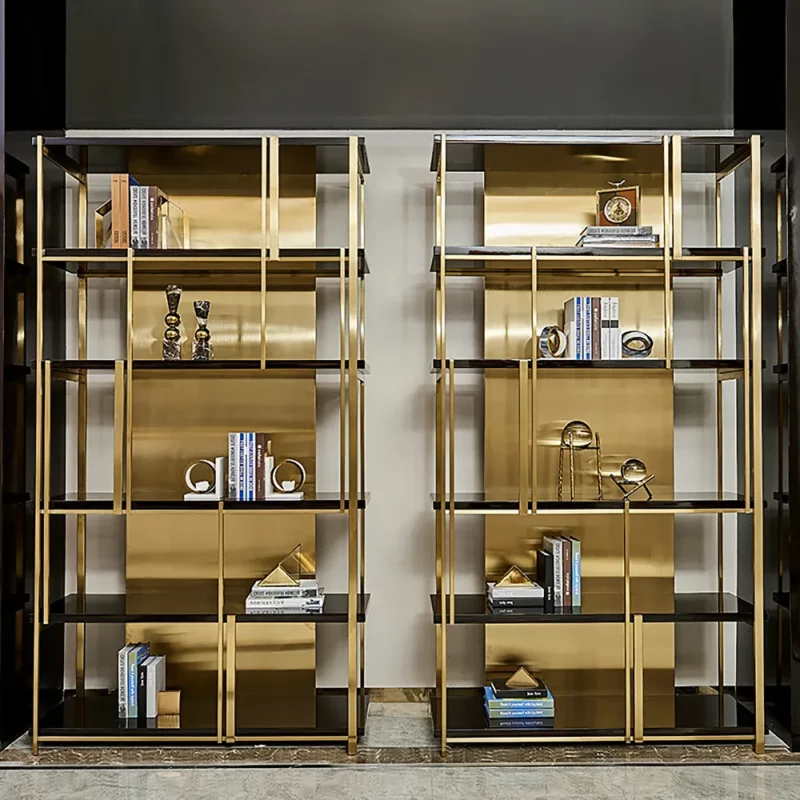 Freestanding modern bookshelf in golden metal 