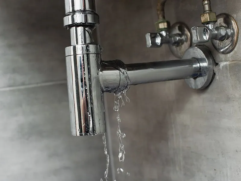 silver plumbing fixture leaking