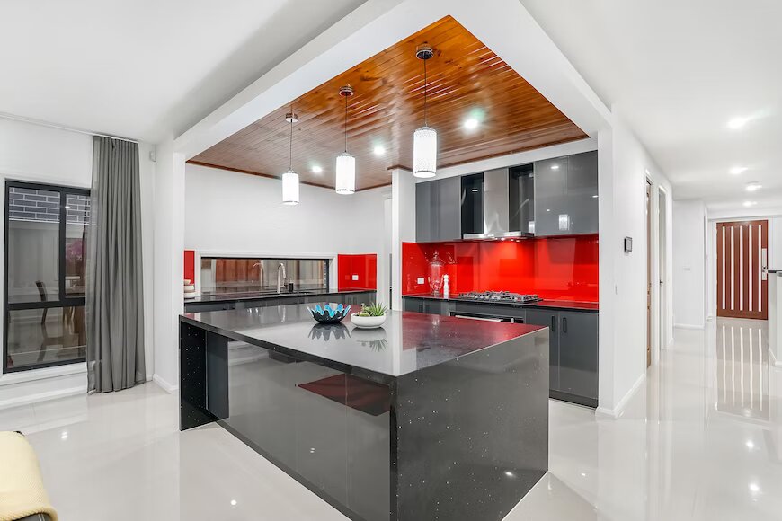 Waterfall edges kitchen countertop in black 