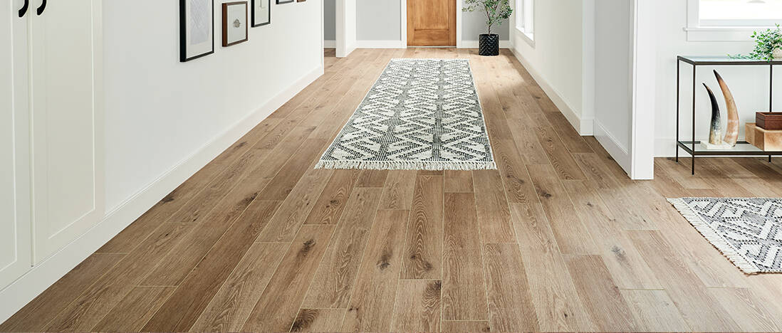 A bright vinyl flooring with a carpet