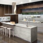 a modern day kitchen with beautiful counter top