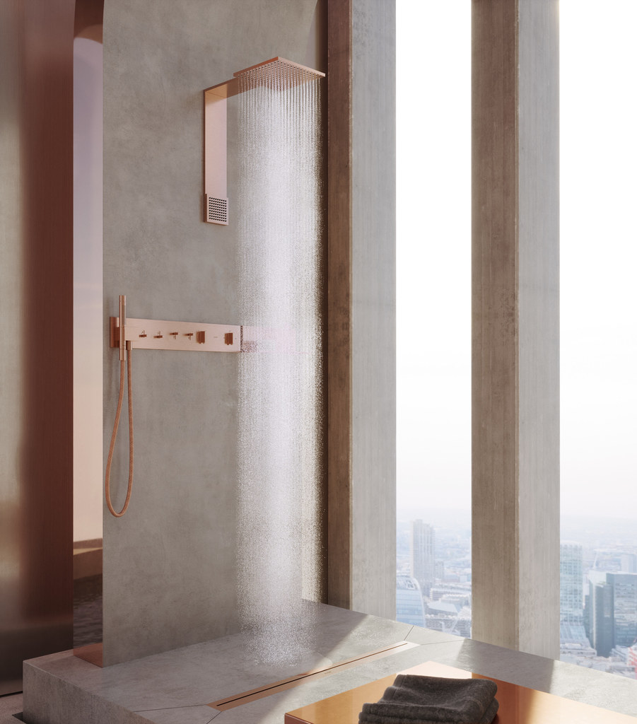 grey bathroom with rosegold bathroom fixtures and coloured sanitary ware