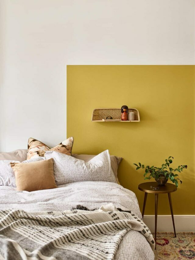 wall paint design yellow with bed