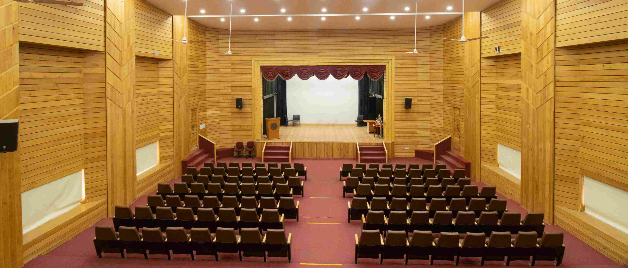 auditorium, wooden interiors, biophilic design, sustainable material