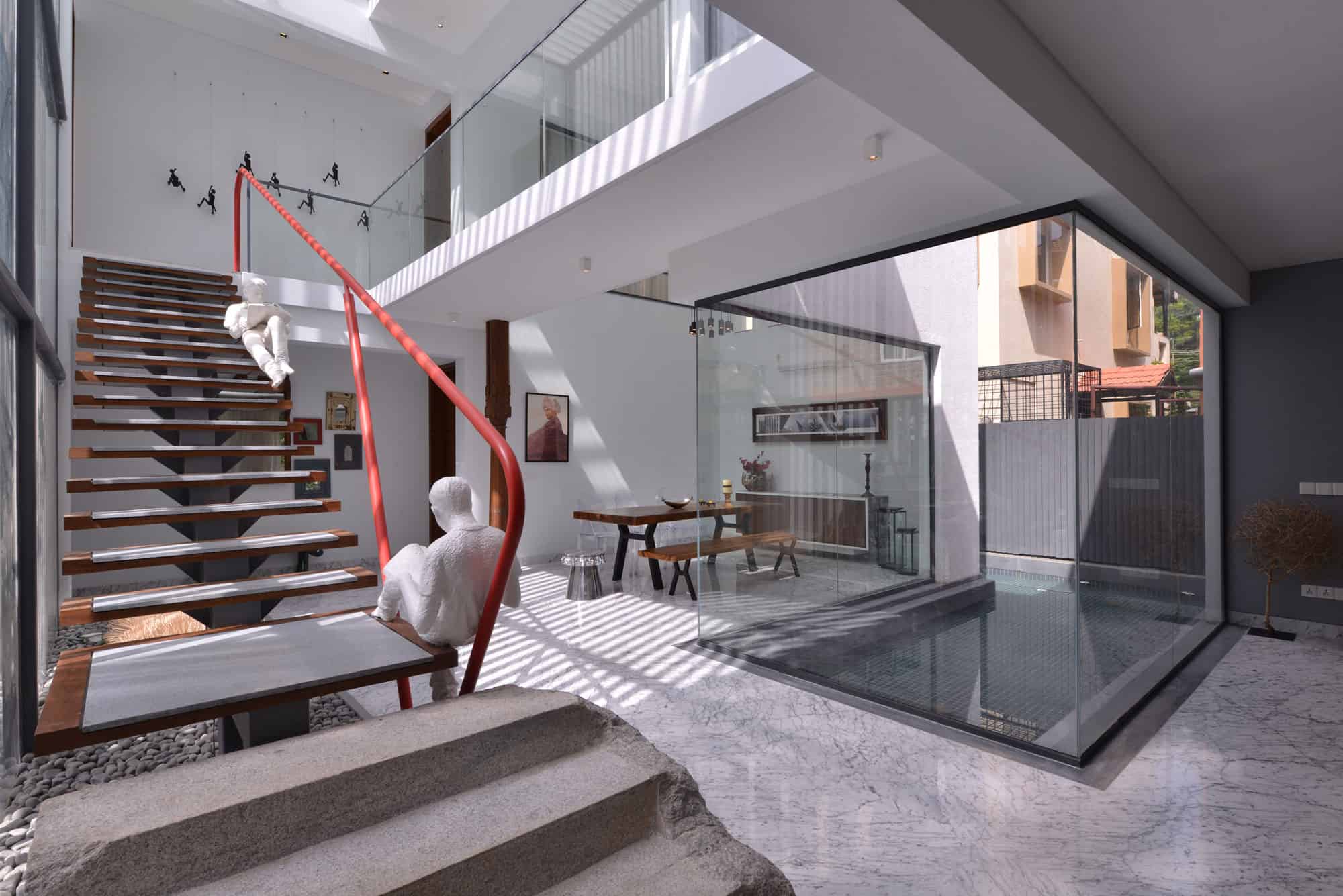 minimal yet modern stairs, connection to enchanting courtyard, sculpture, glass cabin, home decor