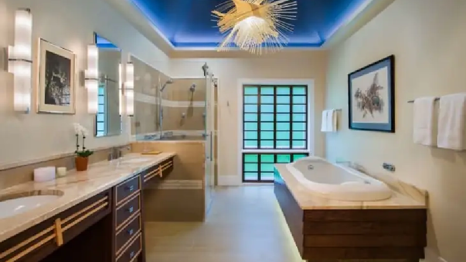 Layered bathroom false ceiling design in light and dark shades