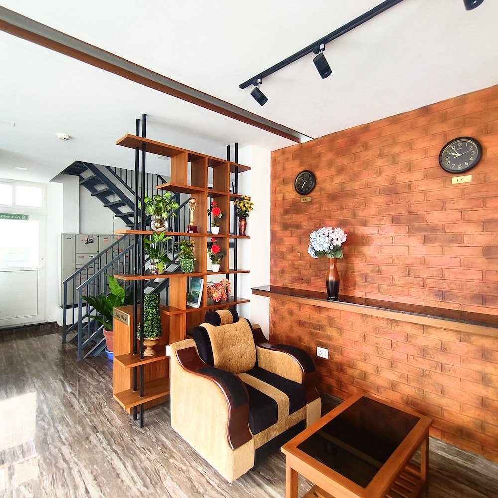 stairs, metal railing, room partition, sofa, furniture, coffee table