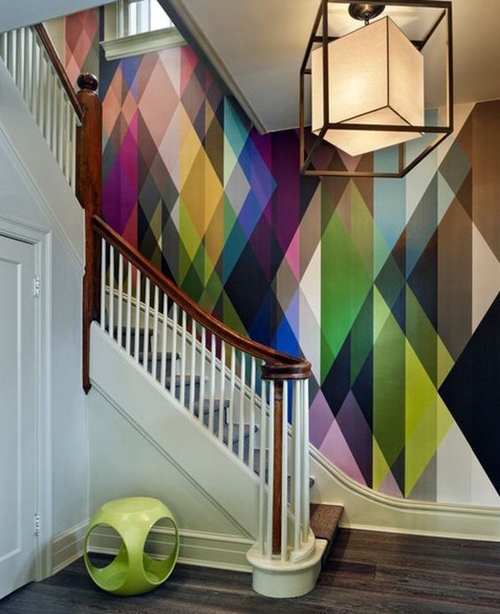 quirky stairway wall decor, geometric patterns, light accent