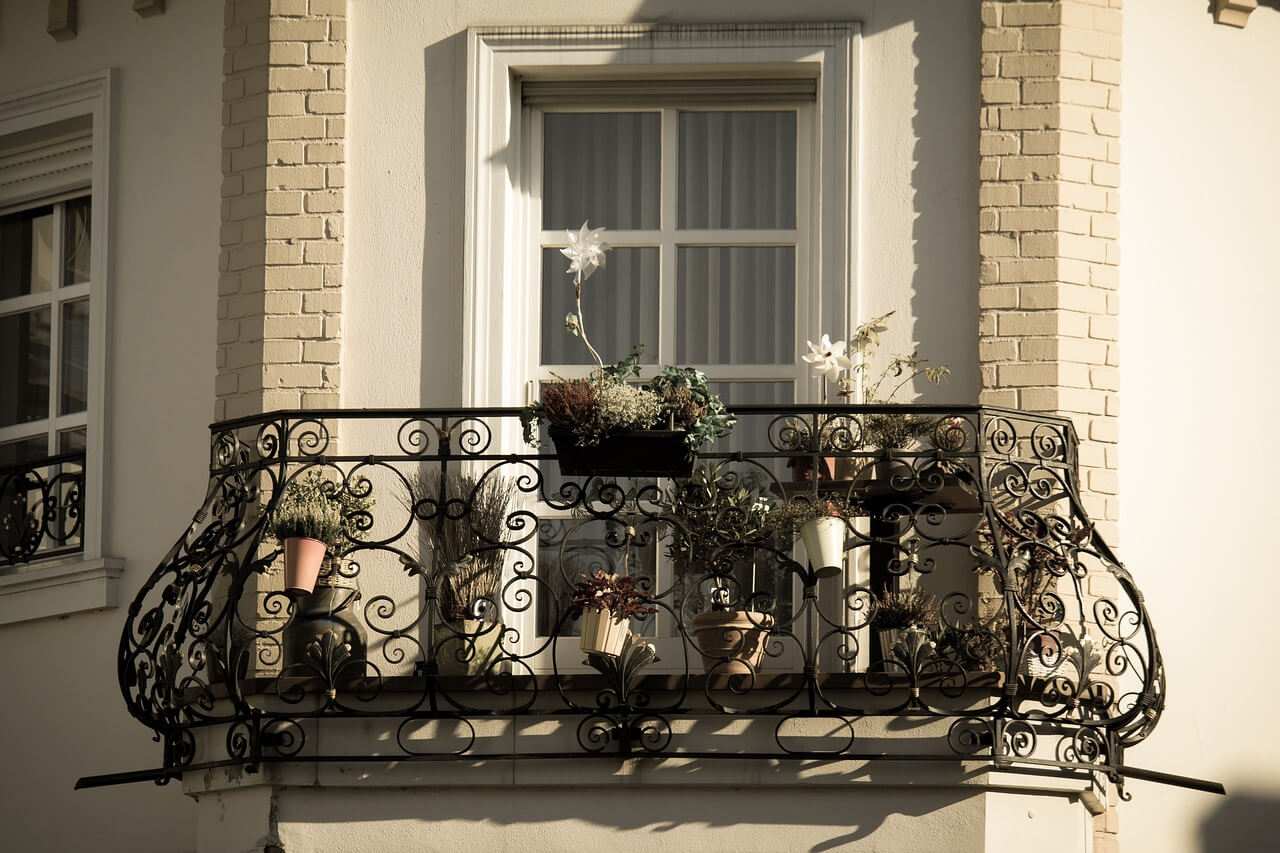 decorative metal railing with intricate floral motif, adding elegance to balcony