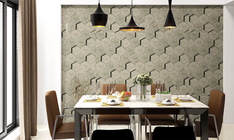 3D shapes on dining area wall with dining table