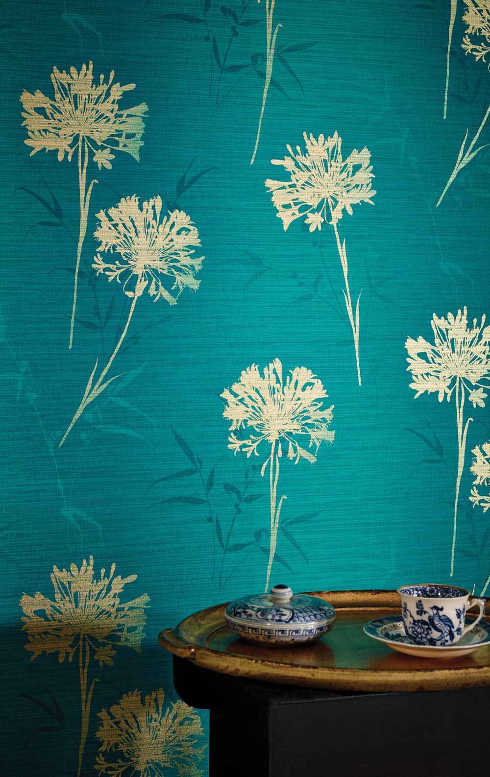 A sky blue wall with floral imprint