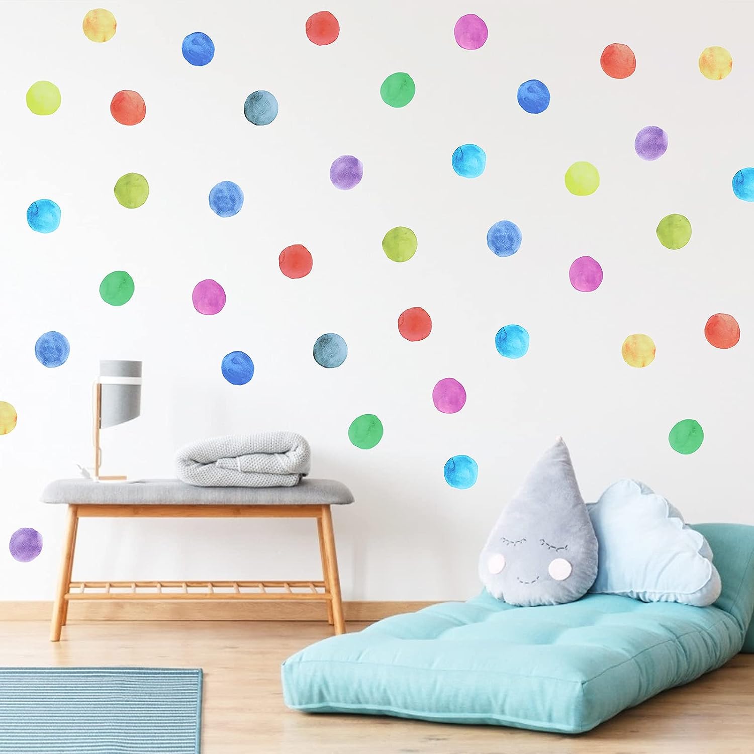 Kids room with polka dot wall paint design idea on wall with bed and table