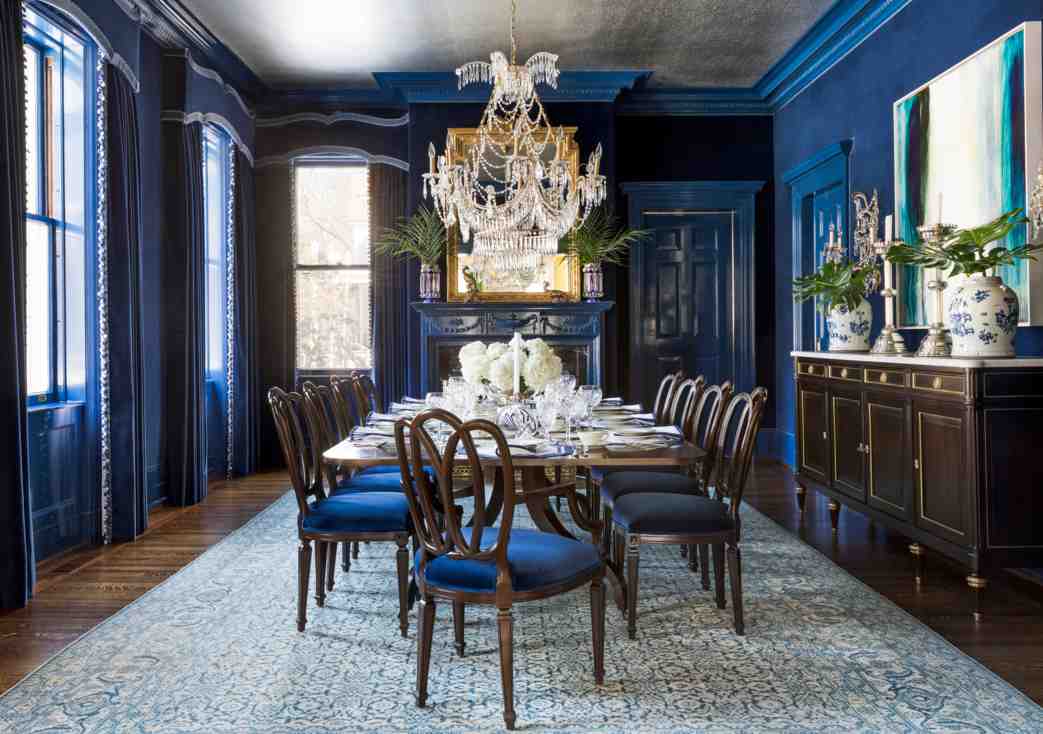 Large sapphire blue dining area with tables and chairs